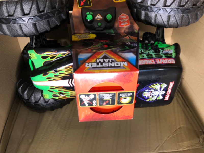 Photo 4 of Monster Jam, Official Mega Grave Digger All-Terrain Remote Control Monster Truck, Over 2 Ft. Tall, 1:6 Scale, Kids Toys for Boys and Girls Ages 4-6+