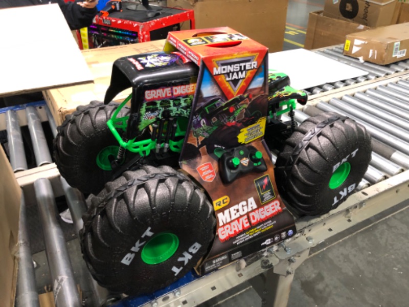 Photo 3 of Monster Jam, Official Mega Grave Digger All-Terrain Remote Control Monster Truck, Over 2 Ft. Tall, 1:6 Scale, Kids Toys for Boys and Girls Ages 4-6+