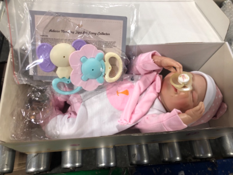 Photo 1 of BABESIDE Lifelike Reborn Baby Dolls - 20-Inch Sweet Smile Realistic-Newborn Baby Dolls Full Body Vinyl Sleeping Baby Girl Real Life Baby Dolls with Toy Accessories Gift Set for Kids Age 3+ hand-painted hair