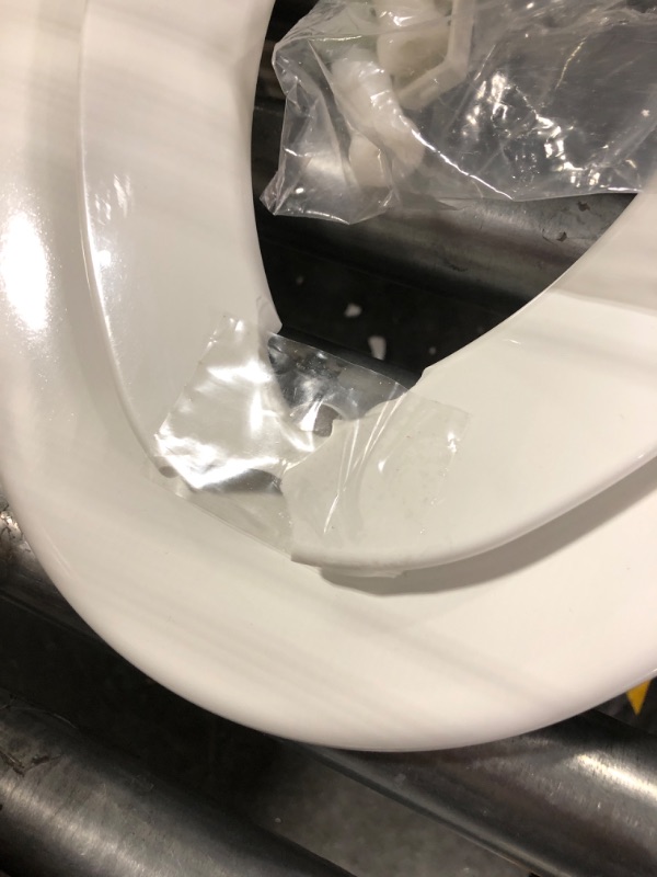 Photo 4 of **SOLD FOR PARTS**
MAYFAIR 1888SLOW 000 NextStep2 Toilet Seat with Built-In Potty Training Seat, Slow-Close, Removable that will Never Loosen, ELONGATED, White Elongated White
**BABY SEAT CRACKED IN MIDDLE**
**MISSING ONE CAP FOR ATTACHMENT