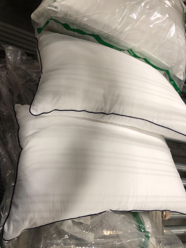 Photo 1 of 2 queen size pillows 