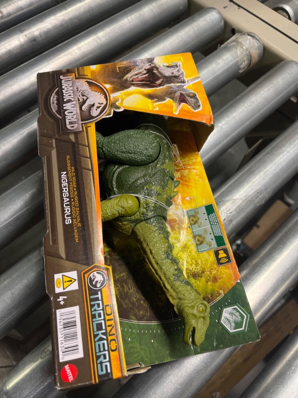 Photo 2 of Jurassic World Dinosaur Toy Nigersaurus with Roar Sound & Attack Action, Wild Roar Posable Figure, Physical & Connected Digital Play