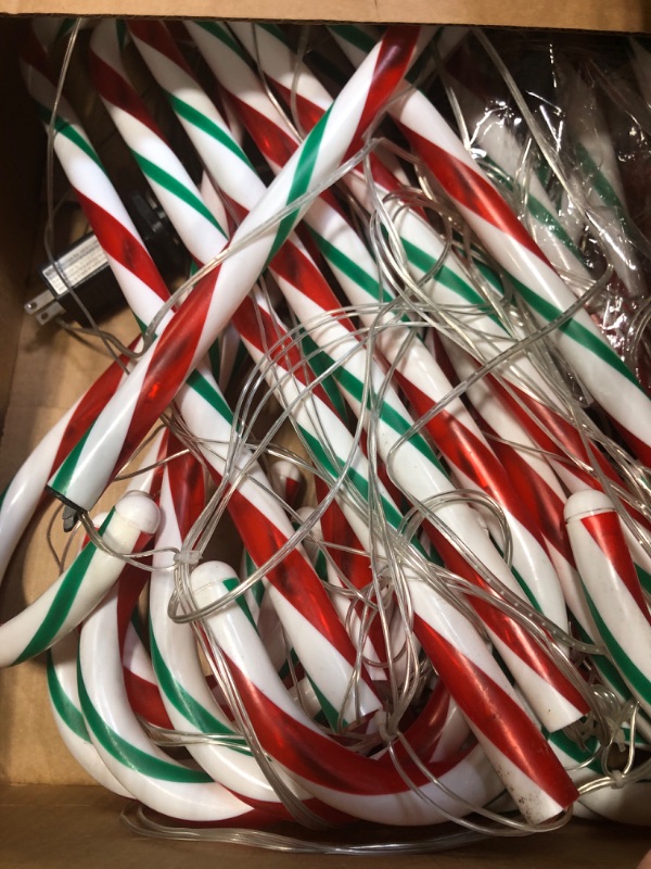 Photo 2 of 30 Pcs Christmas Candy Cane Lights 23'' Candy Cane Pathway Markers Lights with 8 Lighting Modes LED Christmas Outdoor Candy Light with Stake for Christmas Yard Decoration (Red, White, Green)