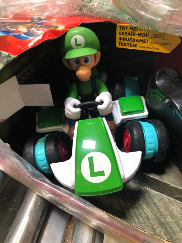Photo 4 of ** BATTERY COMPARTMENT NEEDS REPAIRED FROM RUST** Super Mario 08988-PLY Nintendo Mario Kart 8 Luigi Mini Anti-Gravity Rc Racer 2.4Ghz, with Full Function Steering Create 360 Spins, Whiles & Drift Up To 100" Range - For Kids Ages 4 Plus