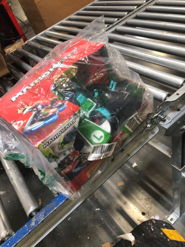 Photo 2 of ** BATTERY COMPARTMENT NEEDS REPAIRED FROM RUST** Super Mario 08988-PLY Nintendo Mario Kart 8 Luigi Mini Anti-Gravity Rc Racer 2.4Ghz, with Full Function Steering Create 360 Spins, Whiles & Drift Up To 100" Range - For Kids Ages 4 Plus