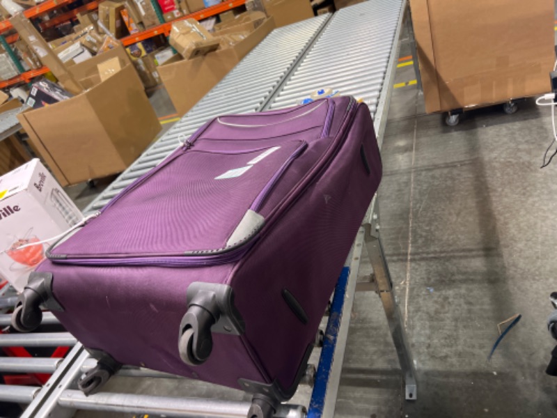 Photo 2 of **USED WITH BROKEN HANDLE** Traveler's Choice Lares Softside Expandable Luggage with Spinner Wheels, Purple, Checked 26-Inch
