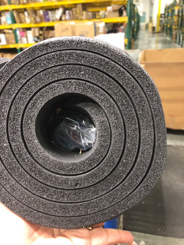 Photo 1 of Amazon Basics Extra Thick Exercise Yoga Gym Floor Mat with Carrying Strap - 74 x 24 x .5 Inches, Black & High-Density Round Foam Roller for Exercise and Recovery - 36 Inch, Black