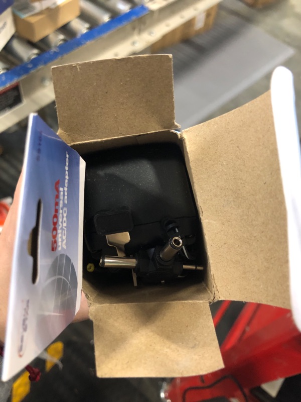 Photo 1 of Seven Star SS104 1.5V, 3V, 4.5V, 6V, 7.5V, 9V, 12V DC, 500mA Regulated Universal AC to DC Converter with Multiple Connector Ends