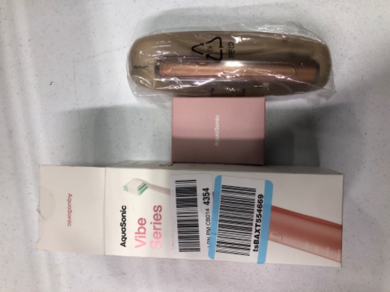 Photo 1 of Aquasonic Vibe Series Ultra Whitening Toothbrush – ADA Accepted Power Toothbrush - 8 Brush Heads & Travel Case – 40,000 VPM Motor & Wireless Charging - 4 Modes w Smart Timer – Satin Rose Gold