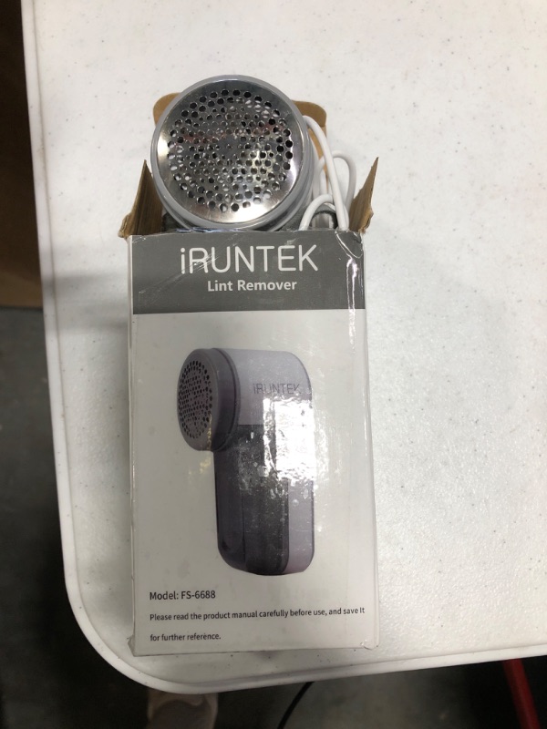 Photo 1 of **USED FOR PARTS** iRUNTEK Battery-Free Fabric Lint Remover, USB Powered Shaver and Lint Brush 2 in 1, Sweater Defuzzer Remove Fuzz, Lint Balls, Pills, Bobbles from Clothes, Furniture, Carpet, Couch USB plug-in use, not rechargeable Gray