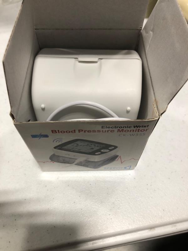 Photo 1 of Blood Pressure Monitor Adjustable Wrist Blood Pressure Cuff Digital BP Machine 2x99 Readings Voice Broadcast Blood Pressure Detector with Carrying Case Portable for Home Use Black-355