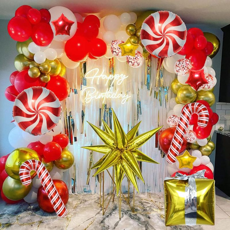 Photo 1 of Christmas Balloon Garland Arch kit with Red White Candy Balloons Gift Box Balloons Red Gold Star Balloons,Gold Explosion Star Foil Balloons for Xmas Party or New Year Party Decorations