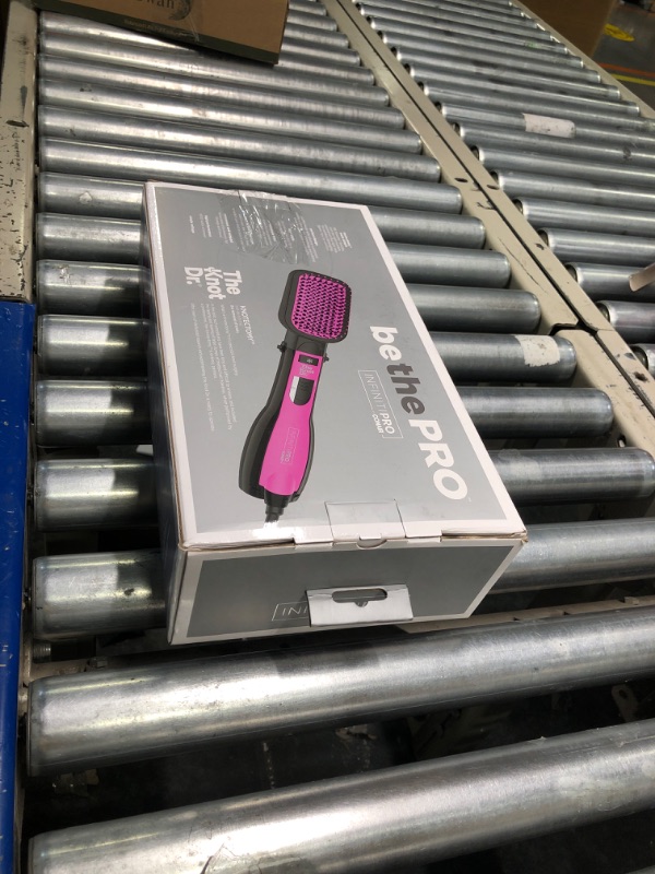 Photo 1 of Conair Knot Dr. Paddle Dryer Brush