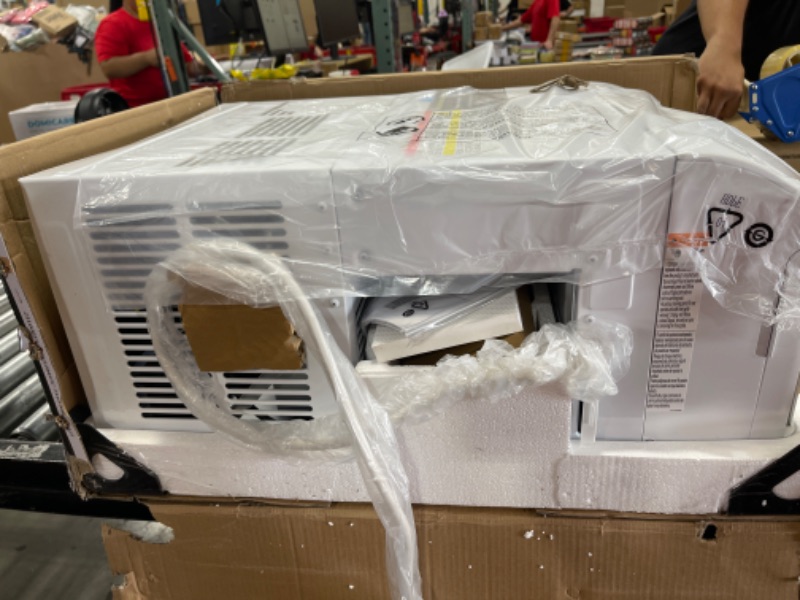 Photo 4 of *FOR PARTS* GE Profile ClearView Inverter Window AirConditioner Unit, 12,200 BTU,115 Volt,U-Shaped Adjustable Depth,Energy Efficient Cooling up to 550 sq ft.,Ultra Quiet, SMART Home Capable,Includes Remote,White 12200 BTU Inverter White