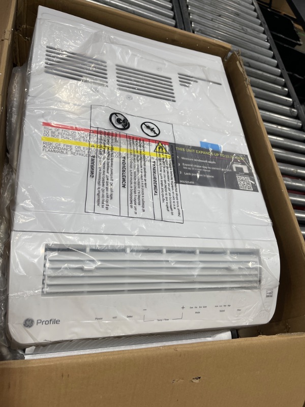 Photo 3 of *FOR PARTS* GE Profile ClearView Inverter Window AirConditioner Unit, 12,200 BTU,115 Volt,U-Shaped Adjustable Depth,Energy Efficient Cooling up to 550 sq ft.,Ultra Quiet, SMART Home Capable,Includes Remote,White 12200 BTU Inverter White