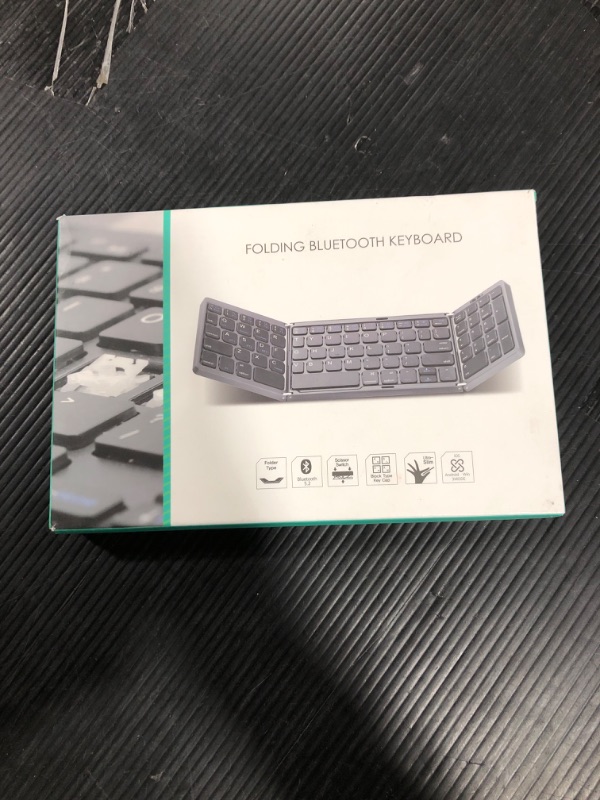 Photo 2 of  Foldable Bluetooth Keyboard, BK03 Folding Travel Keyboard, Metal Build, USB-C Charge, Portable Keyboard with Stand Holder for Laptop, iPad, iPhone, Smartphone and Tablet, 