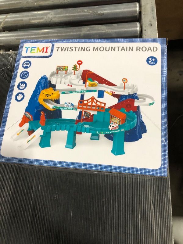 Photo 2 of TEMI Boys Race Track Car Garage Parking Adventure Toy Gifts 3 4 5 6 7 8 9 Years Old Boys Girls Toddlers, Preschool Car Games Gift Toys for Kids Vehicle Playsets (Dinosaur Track Car1232-48)