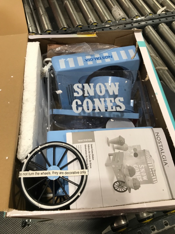 Photo 1 of Nostalgia Snow Cone Shaved Ice Machine - Retro Table-Top Slushie Machine Makes 20 Icy Treats - Includes 2 Reusable Plastic Cups & Ice Scoop - Blue
