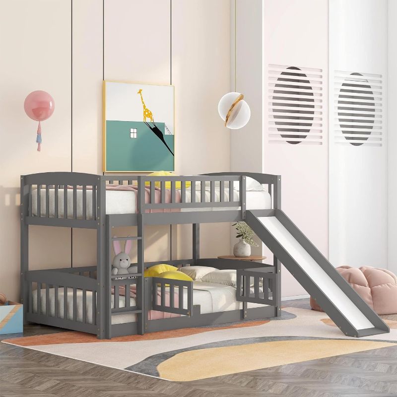 Photo 1 of Bunk Bed with Fence and Slide,Twin Over Twin Low Bed Frame with Ladder and Full-Length Guardrail for Boys Girls Bedroom,No Box Spring Needed (Grey)
