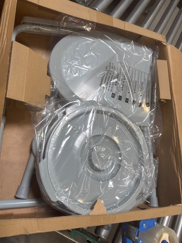 Photo 1 of Drive Medical 11148-1 Folding Steel Bedside Commode Chair, Portable Toilet, Supports Individuals Weighing Up To 350 Lbs, with 7.5 Qt. Bucket and 13.5 Inch Seat, Grey