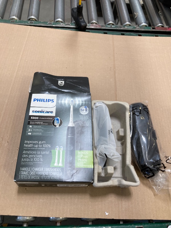 Photo 1 of Philips Sonicare ProtectiveClean 5300 Rechargeable Electric Toothbrush, with Pressure Sensor, 3 Cleaning Modes, SmarTimer and QuadPacer,  Travel Case, Black, Model HX6423/34
