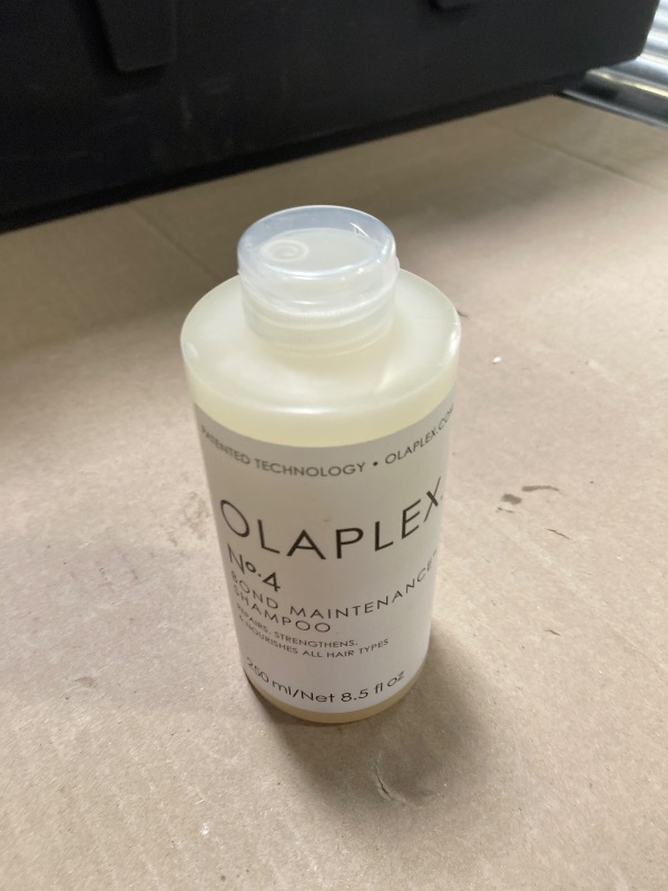 Photo 1 of Olaplex No. 4 Bond Maintenance Shampoo, Repairs, Strengthens, & Nourishes All Hair Types, Adds Shine & Leaves Hair Feeling Soft, 8.5 fl oz