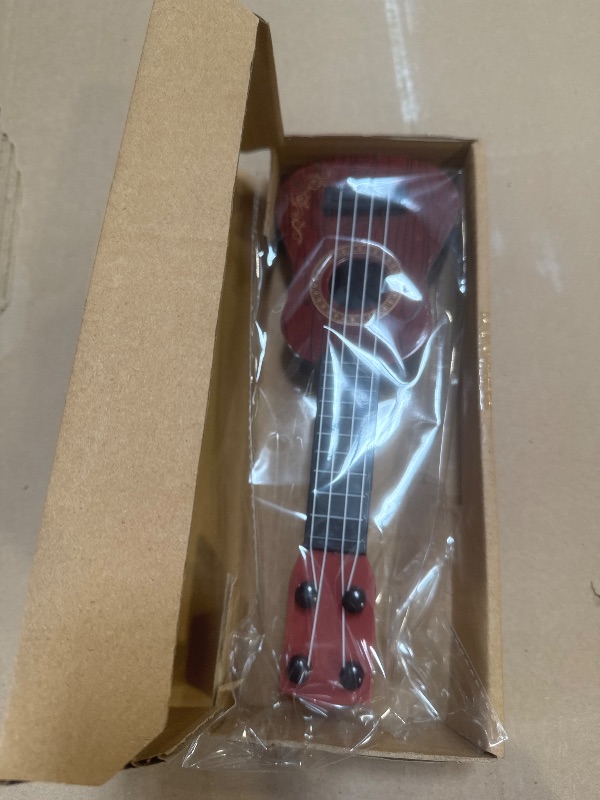 Photo 1 of Kisangel 1pc Kids Toy Guitar Ukulele Guitar Musical Instrument Ukulele Musical Toy for Boys and Girls(Brown)