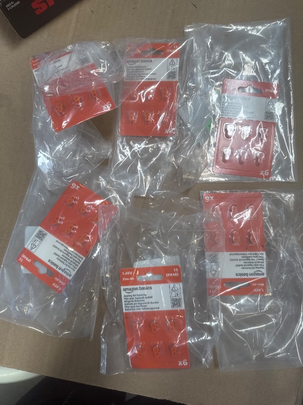 Photo 1 of Pack of 6 Amazon Basics Hearing Aid Size 13 Zinc-Air Batteries, 1.45 Volt, Orange Tab, 4-Year Shelf Life