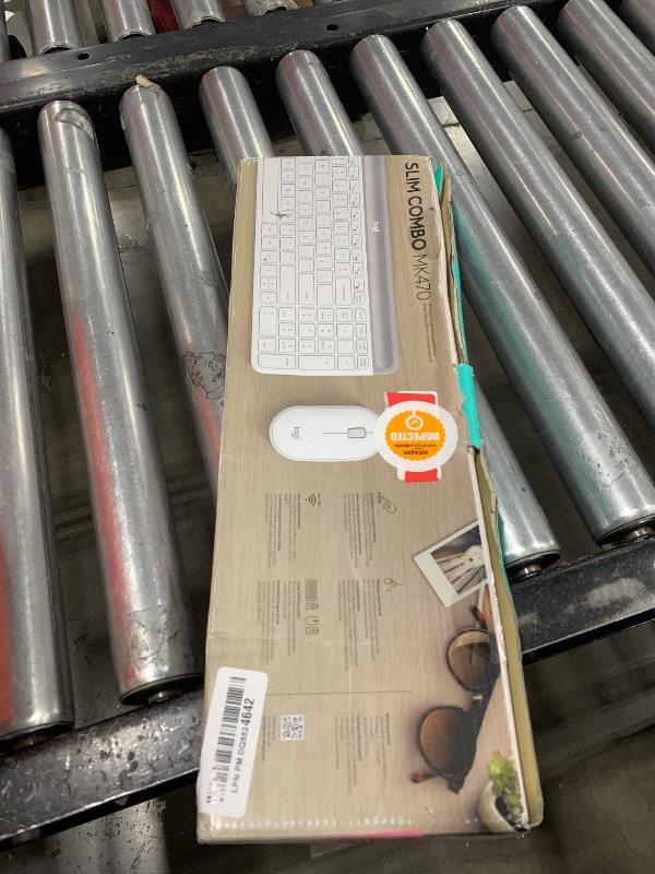 Photo 1 of Logitech MK470 Slim Wireless Keyboard and Mouse Combo - Modern Compact Layout, Ultra Quiet, 2.4 GHz USB Receiver, Plug n' Play Connectivity, Compatible with Windows - Off White