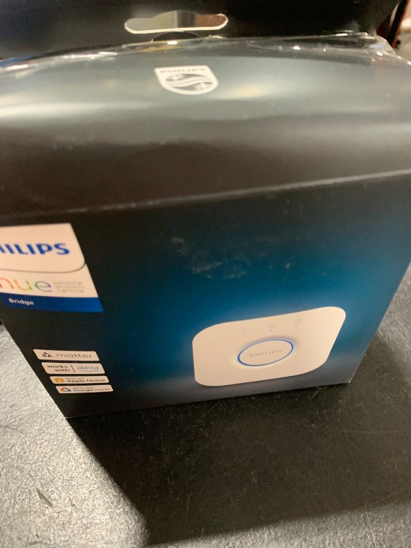 Photo 1 of Philips Hue Bridge - Unlock the Full Potential of Hue - Multi-Room and Out-of-Home Control - Create Automations and Zones - Secure, Stable Connection Won't Strain Your Wi-Fi - Works with Voice, Matter