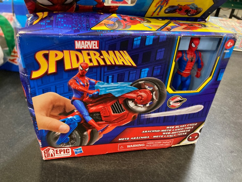 Photo 1 of Marvel Spider-Man Web Blast Cycle, 4-Inch Action Figure with Vehicle and 2 Web Projectiles, Kids Playset for Ages 4 and Up