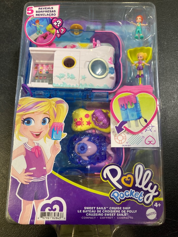 Photo 1 of Polly Pocket Playset, Travel Toy with 2 Micro Dolls, Boat & Water Play Accessories, Pocket World Sweet Sails Cruise Ship Compact