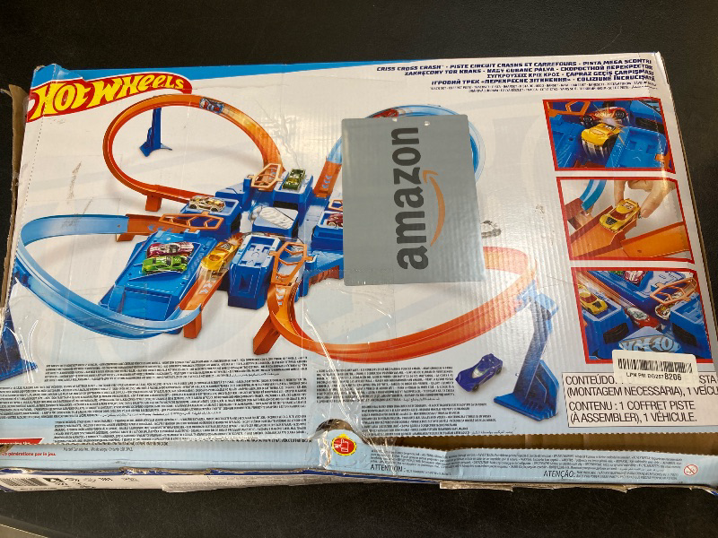 Photo 1 of Hot Wheels Toy Car Track Set, Criss Cross Crash with 1:64 Scale Vehicle, Powered by a Motorized Booster (Amazon Exclusive)