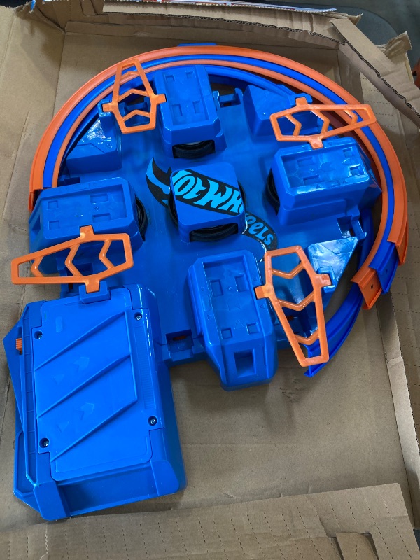Photo 1 of Hot Wheels Toy Car Track Set, Criss Cross Crash with 1:64 Scale Vehicle, Powered by a Motorized Booster (Amazon Exclusive)