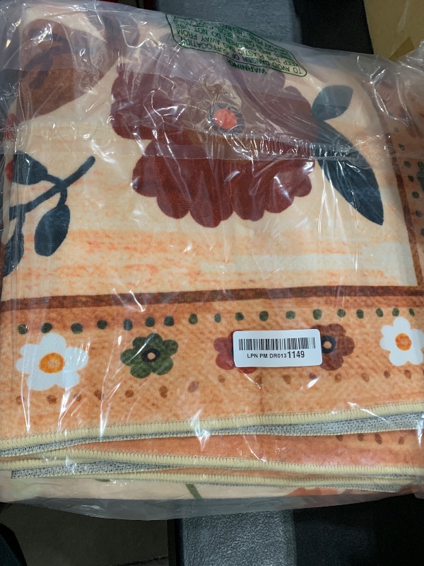 Photo 1 of RELEANY Floral 5x7 Area Rug Machine Washable Boho Carpet Non Slip Doormat Low Pile Flower Area Rugs for Living Room Bedroom Kitchen Dining Room Hallway Entryway Indoor-Light Orange