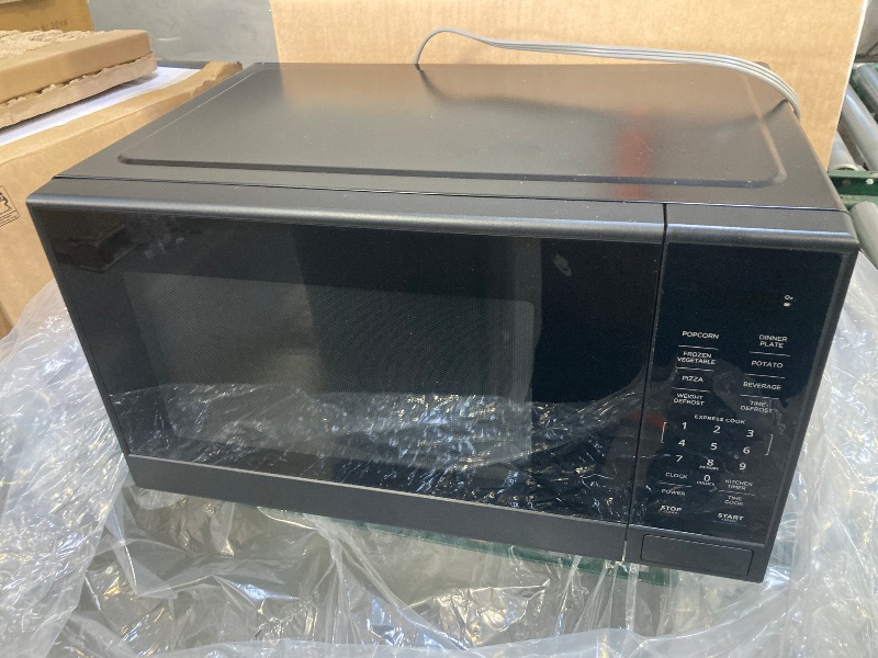Photo 1 of Mainstays 1.1 Cu ft Countertop Microwave Oven