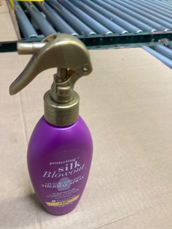 Photo 1 of Ogx Silk Blowout Thermal Spray 6 Ounce Pump