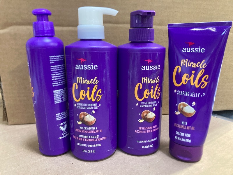 Photo 1 of Aussie Miracle Coils SF Shampoo 16oz + Aussie Miracle Coils Conditioner 16 oz + Aussie Miracle Coils Shaping Jelly 6.8oz + Aussie Miracle Coils Leave-In Moisturizer 8.5 oz