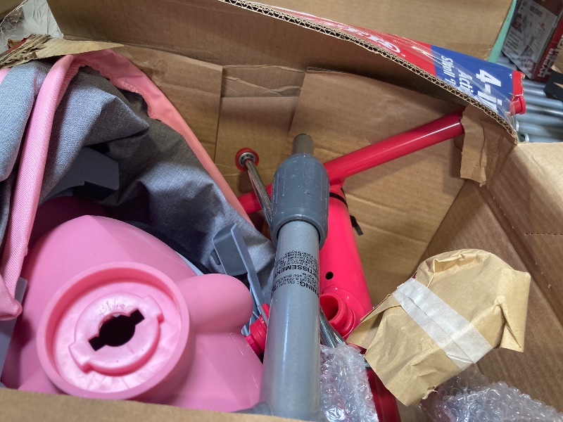 Photo 1 of  Radio Flyer 4-in-1 Stroll N Trike with Activity Tray Pink & Gray Tricycle for Girls and Boys 