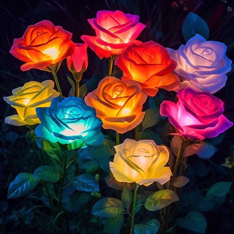 Photo 1 of ****USED**Solar Lights Outdoor Waterproof, 4 Pack Solar Garden Lights Outside, Outdoor Solar Lights for Yard with 20 Rose Solar Flowers Lights, Garden Lights Solar Powered Waterproof Yard Decorations Outdoor