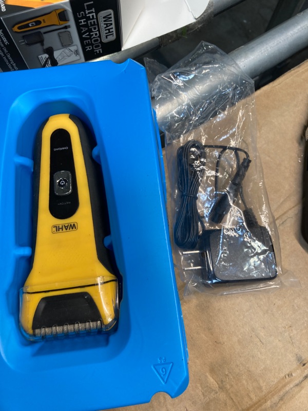 Photo 2 of ***AS IS / NO RETURNS -  FINAL SALE***
Wahl Waterproof Rechargeable Electric Shaver with Precision Trimmer for Men's Beard Shaving and Grooming, Long Run Time and Quick Charge - Model 7061-100 Yellow / Black