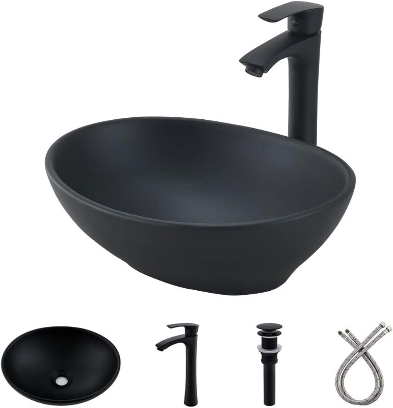 Photo 1 of ***USED** Oval Black Vessel Sink with Faucet and Drain Combo -Bokaiya 16x13 Ceramic Bathroom Sink Above Counter Vessel Sink Oval Porcelain Ceramic Bathroom Lavatory Vanity Sink Art Basin Set