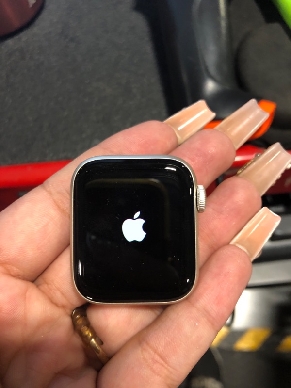 Photo 5 of Apple Watch SE GPS (2023, 2nd Generation) 40mm Starlight Aluminum Case with Starlight Sport Band - S/M
