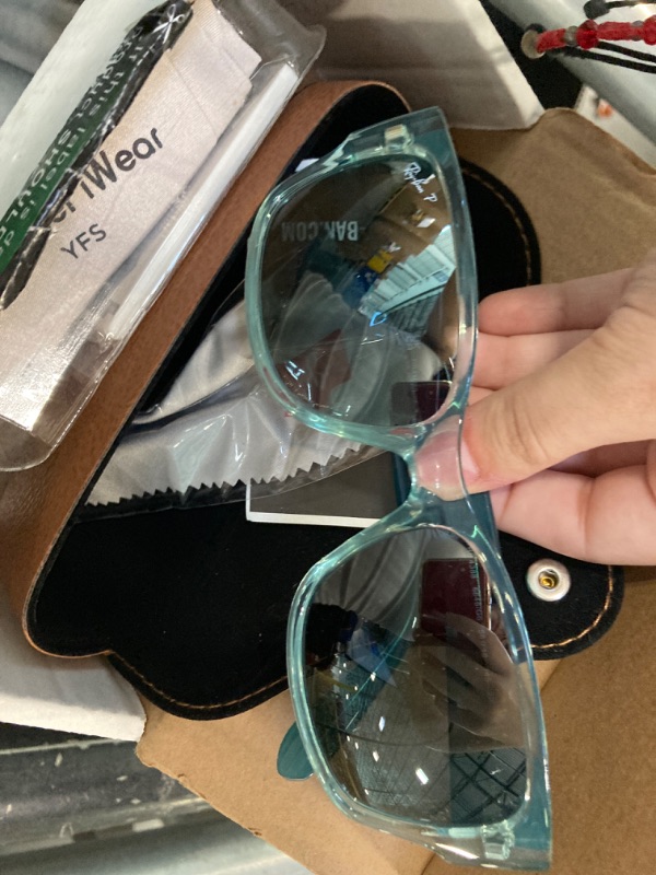 Photo 4 of ***color is a blueish teal, see pics***
Ray-Ban RB4388 6646G6 58MM Transparent Green/Polarized Blue Square Sunglasses for Men for Women + BUNDLE With Designer iWear Kit