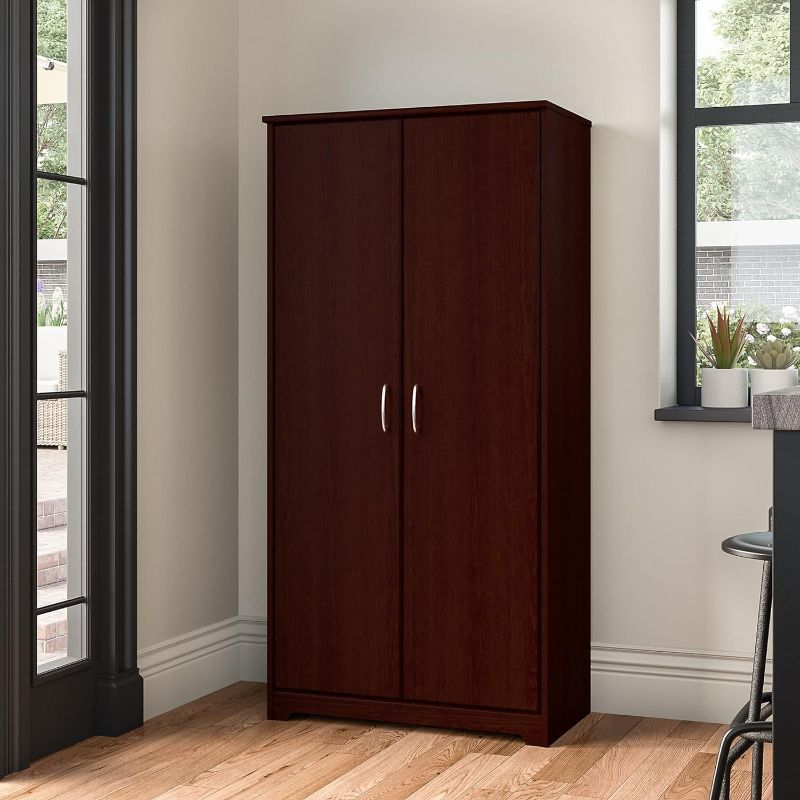 Photo 1 of Bush Furniture Cabot Tall Storage Cabinet with Doors in Harvest Cherry
