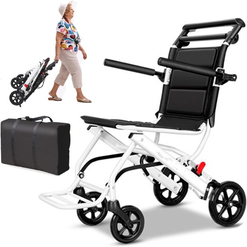 Photo 1 of (only 15lb) Super Lightweight Transport Wheelchair. Easy to Travel, Locking Hand Brakes, User-Friendly, Folding, Portable. for Adults or Child (up to 220lbs)) …
