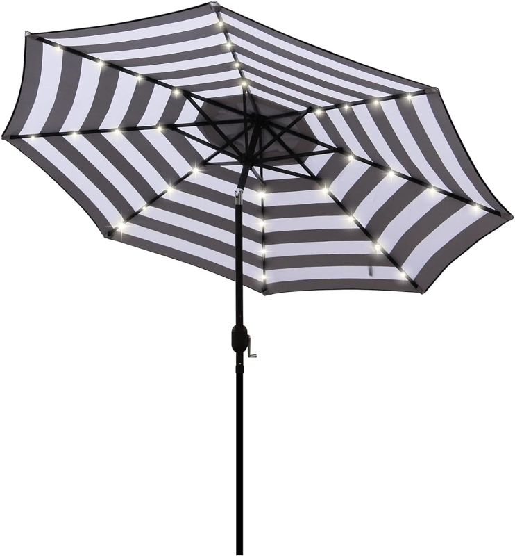 Photo 1 of Blissun 9 ft Solar Umbrella 32 LED Lighted Patio Umbrella Table Market Umbrella with Tilt and Crank Outdoor Umbrella for Garden, Deck, Backyard, Pool and Beach (Black and White)
