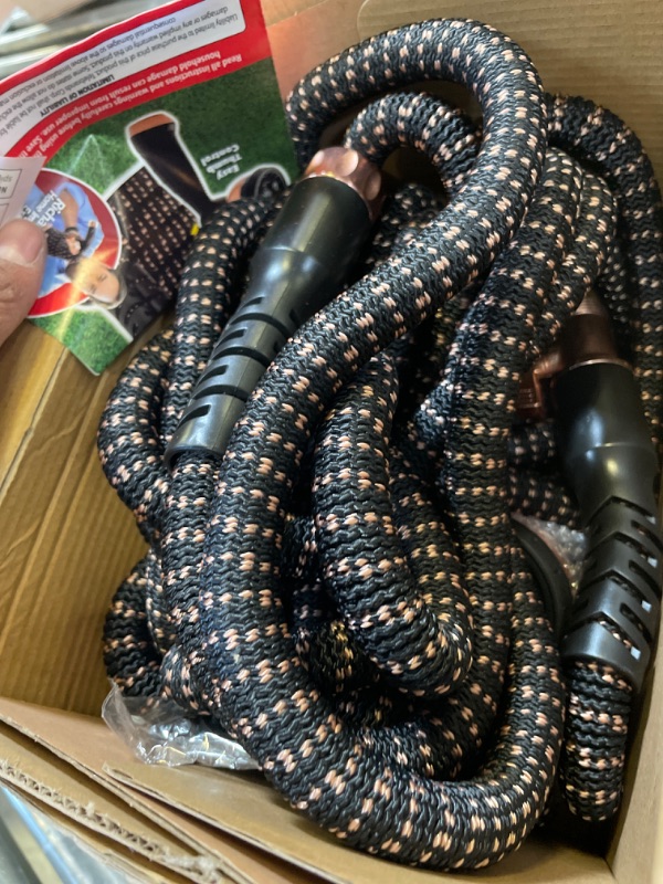 Photo 1 of Pocket Hose Copper Bullet Expandable Garden Hose w/10 Pattern Thumb Spray Nozzle AS-SEEN-ON-TV 100 FT 650psi 3/4 in Patented Lead-Free Ultra-Lightweight Solid Copper Anodized Aluminum Fittings No-Kink