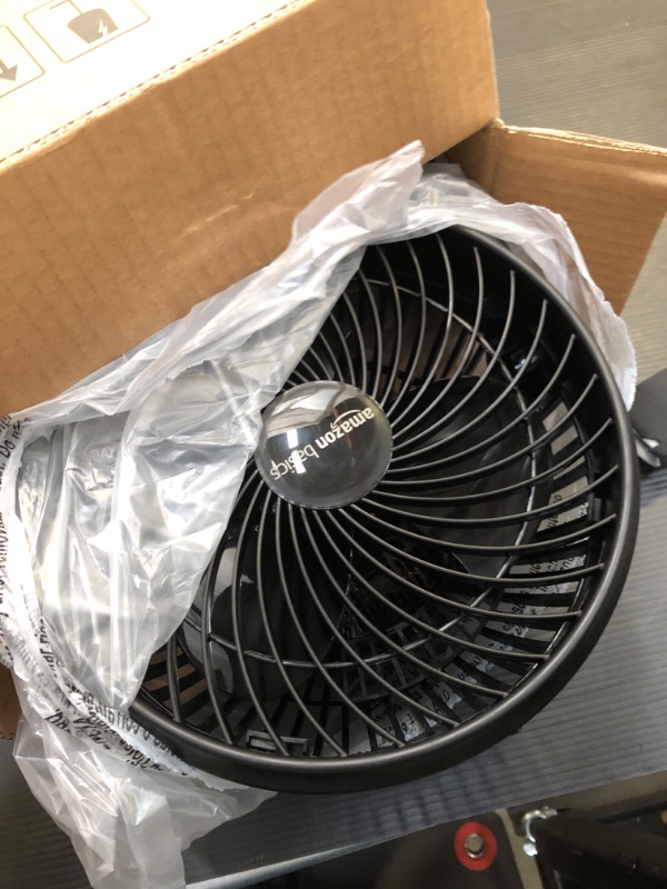 Photo 2 of Amazon Basics 11-Inch Air Circulator Fan with 90-Degree Tilt Head and 3 Speed Settings, Ultra Quiet (30 dB), Lightweight (3 LBS), Black, 6.3"D x 11.1"W x 10.9"H