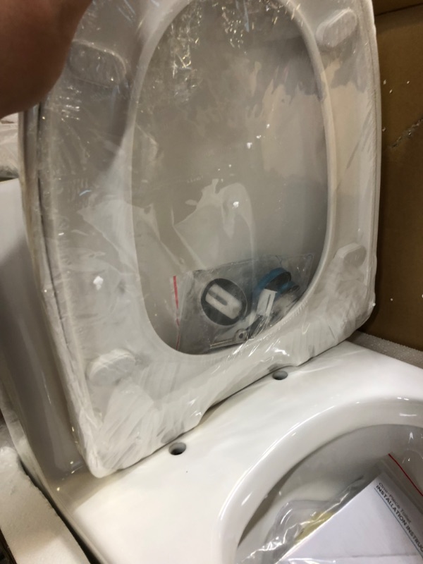 Photo 1 of Swiss Madison SM-1T257 Sublime II Compact 24" Length One Piece Toilet Dual Flush 1.1/1.6 GPF with Side Holes, Glossy White Dual Flush Compact Glossy White